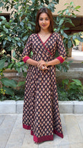 Side view of black handloom cotton long dress showing A-line drape