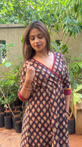 Detail of small floral buti motifs hand block printed on black handloom cotton