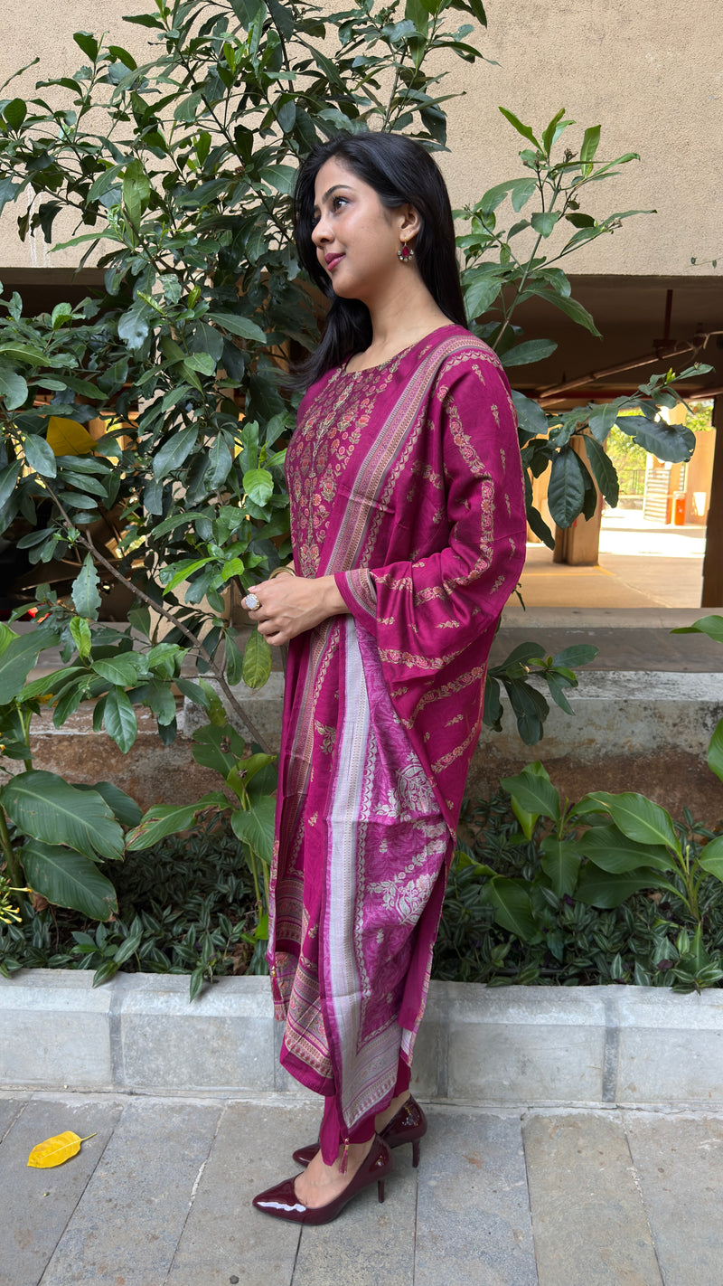 Side view of magenta art silk kurta showing yoke embroidery and matching pants