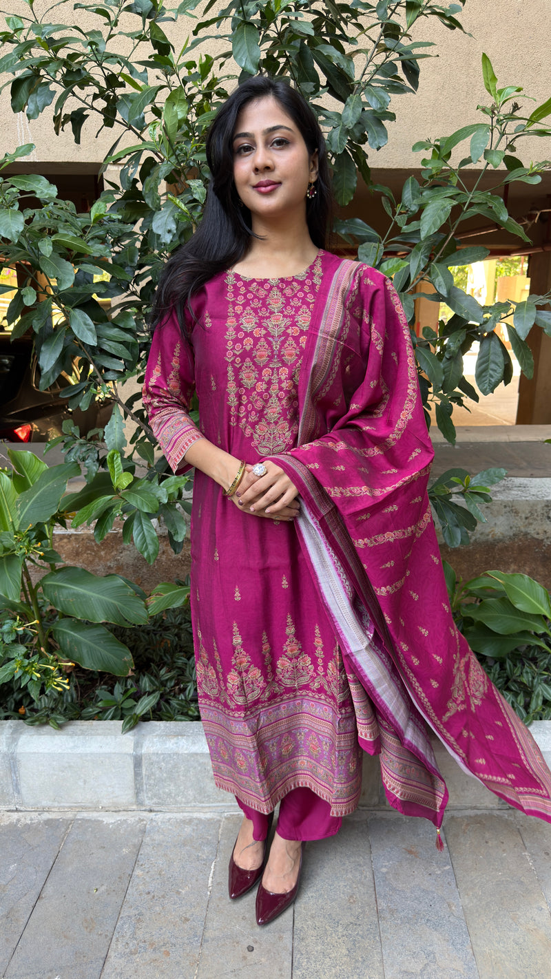 Front view of magenta kurta set with matching embroidered dupatta