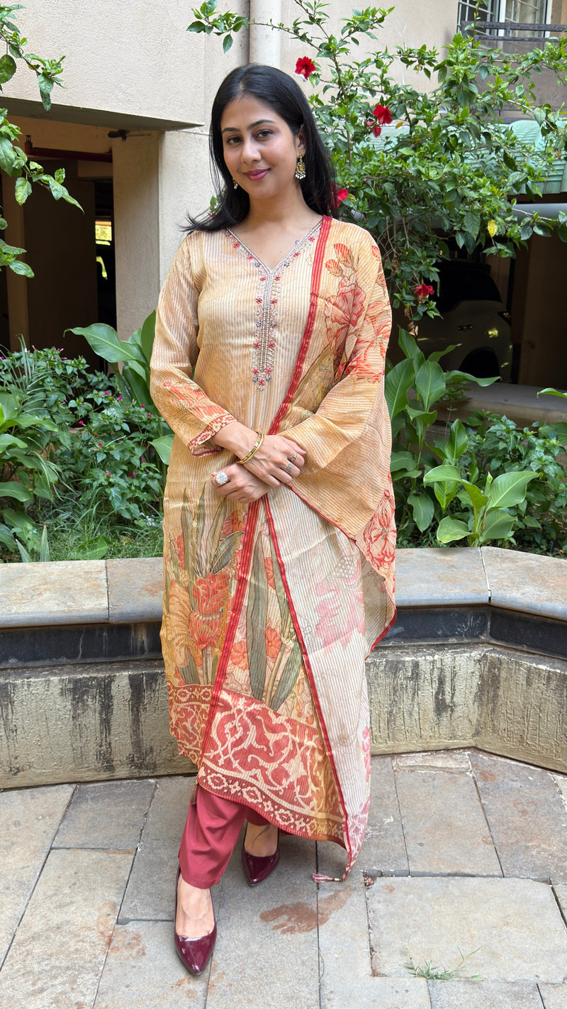 Front view of beige kurta with embroidered red placket and matching floral printed dupatta