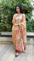 Detail of bold coral and crimson floral print on dupatta