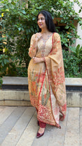 Close-up of embroidered placket against beige fabric