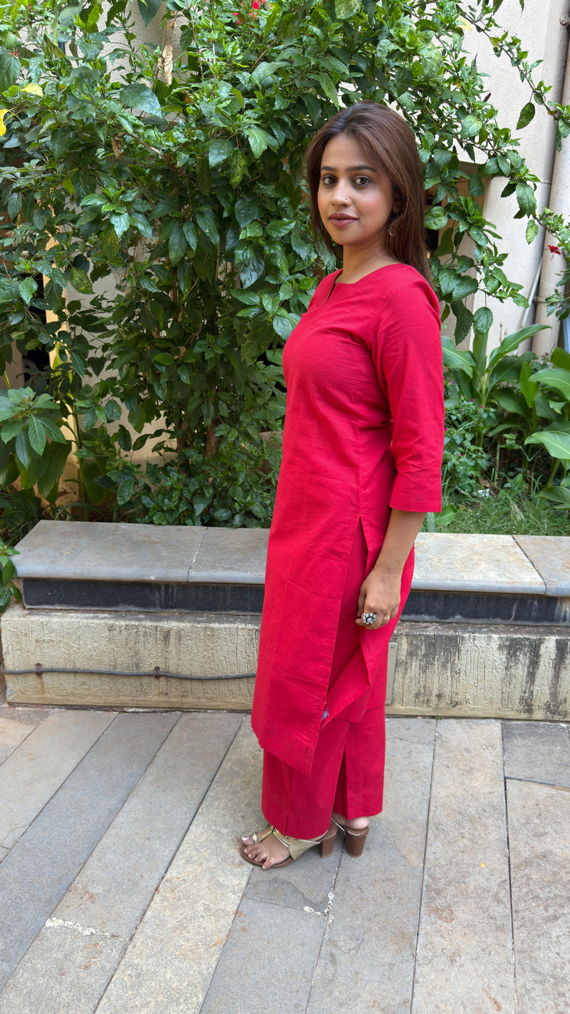 Side view of red kurta showing fit and pants