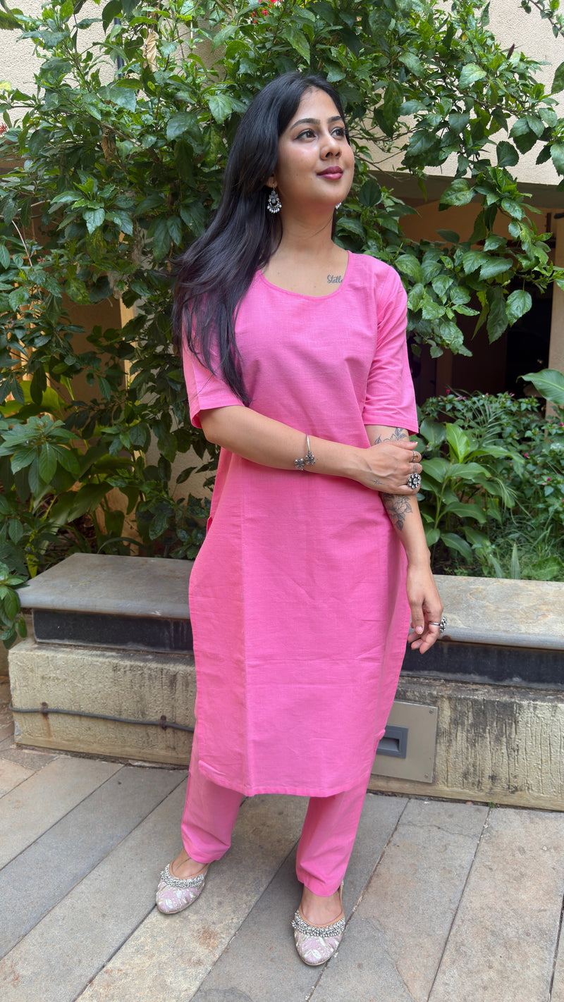 Three-quarter view of pink handloom cotton kurta set