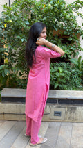Side view of pink kurta showing relaxed fit