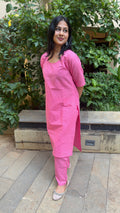 Detail of pink handloom cotton fabric with soft slub