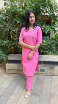 Close-up of pink kurta scoop neckline