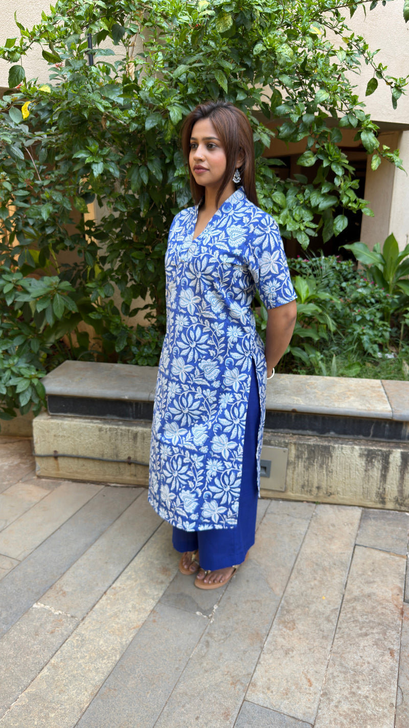 Side view of blue printed kurta showing V-neckline and elbow sleeves