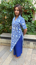 Full-length view of blue and white block print kurta set
