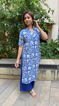 Close-up of V-neckline on blue and white kurta