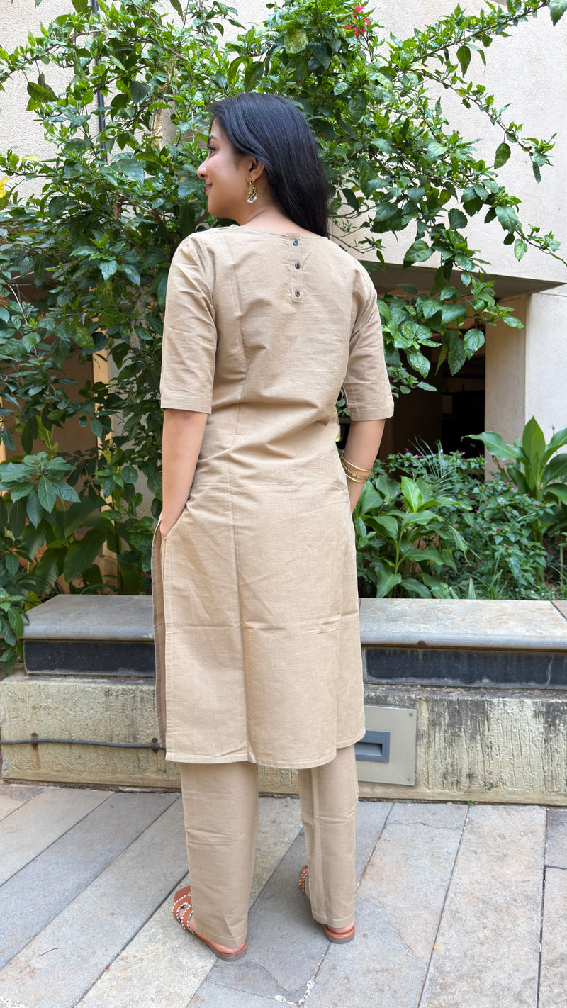 Side view of beige kurta showing regular fit and matching pants