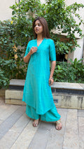 Front view of teal kurta with V-neckline and elbow sleeves