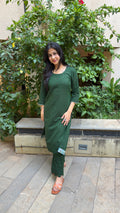 Side view of dark green plain kurta with matching pants