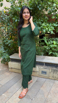 Detail of dark green handloom cotton fabric