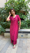 Full-length view of magenta polka dot kurta set