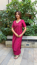 Close-up of magenta kurta V-neckline