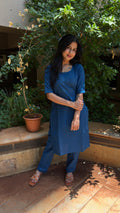Three-quarter view of steel blue handloom cotton kurta