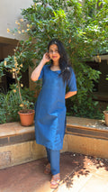 Full-length view of steel blue plain kurta set