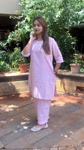 Full-length view of light pink kurta set with subtle print