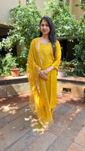 Side view of yellow chikankari kurta showing dupatta border