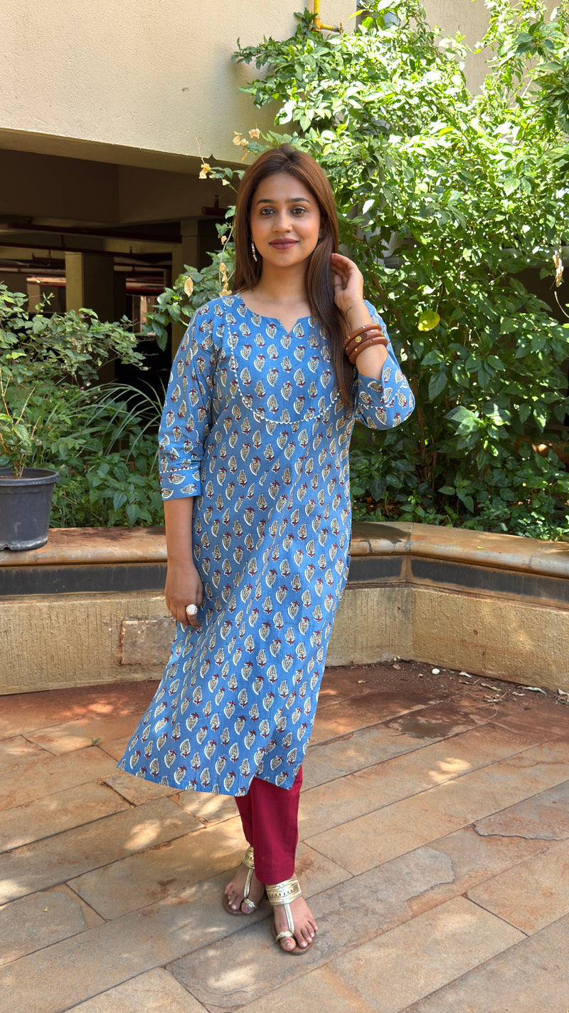 Side view of blue printed kurta showing fit and maroon pants