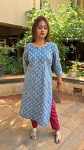 Close-up of embroidered V-neckline on blue kurta