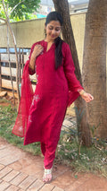 Detail of sheer maroon organza dupatta with white embroidered border