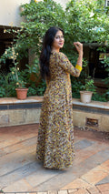 Front view of olive long dress showing mustard floral block print across the body