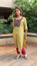 Detail of small Ajrakh motifs printed on yellow cotton