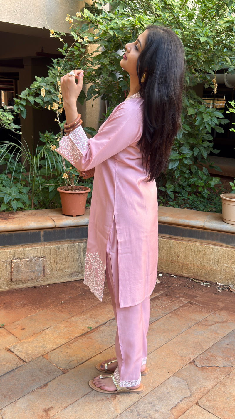 Side view of pink kurta showing relaxed silhouette and pants