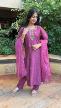 Full-length view of mauve kurta set with embroidered detailing