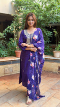 Full-length view of purple art silk kurta set with floral dupatta