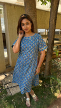 Full-length view of blue handloom cotton kaftan in natural light