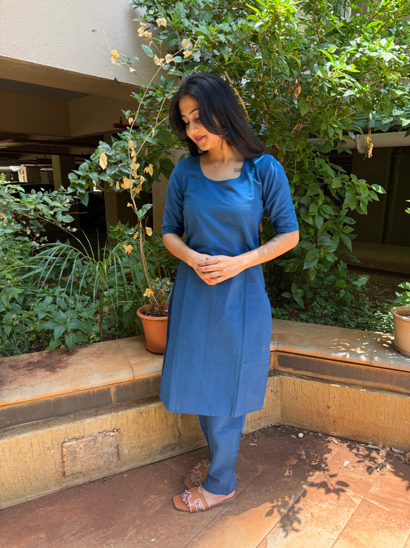 Side view of royal blue short kurta with matching pants