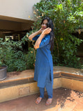 Model in royal blue kurta walking outdoors