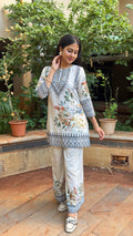 Detail of embroidered yoke on ivory short kurta