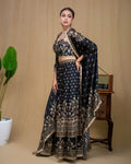 Full-length view of black floral modal cape set with open jacket and wide trousers