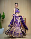 Full length shot of deep purple hand embroidered modal lehenga set for festive occasions