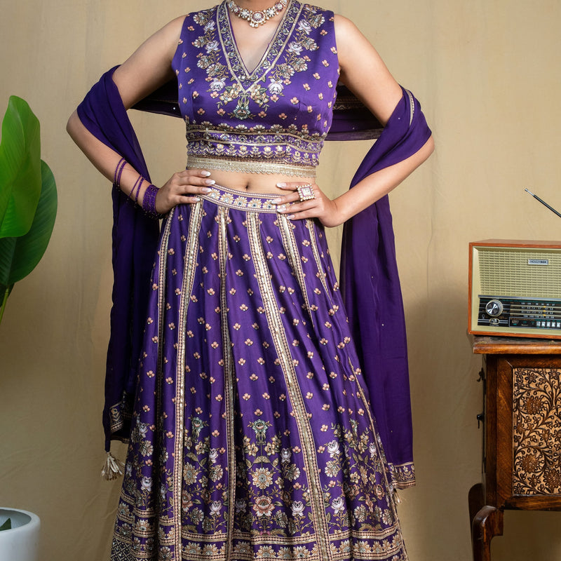 Detail of fine floral print and embroidery on purple modal lehenga skirt hem