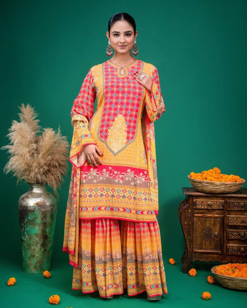 Close-up of keyhole neckline and geometric printed pattern on coral georgette tunic.