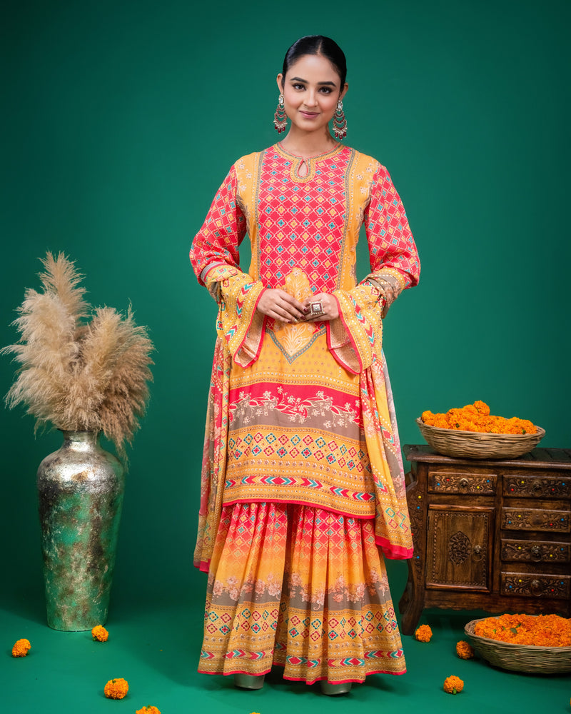 Detail view of flared bell sleeves with printed chevron borders and geometric motifs.