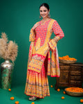 Side view of model showcasing the fluid drape of printed georgette dupatta and tunic.