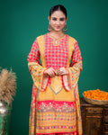 Close-up of delicate printed border detailing on the hem of coral georgette kurta.