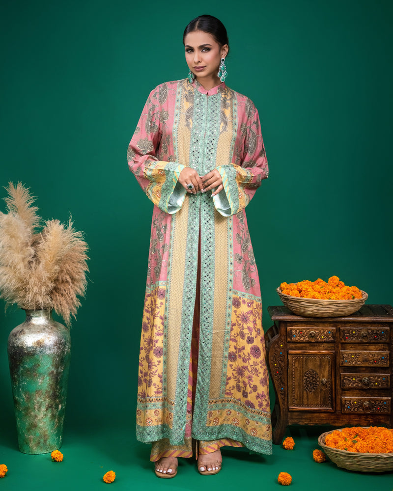 Front view of woman wearing pink and yellow printed modal Indo-western dress with hand embroidery