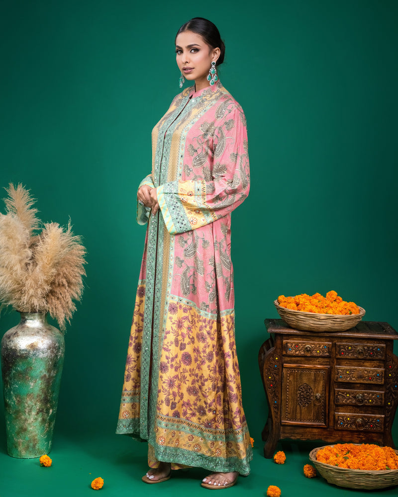 Close-up of hand embroidered mint placket and mirror work on pink modal Indo-western dress