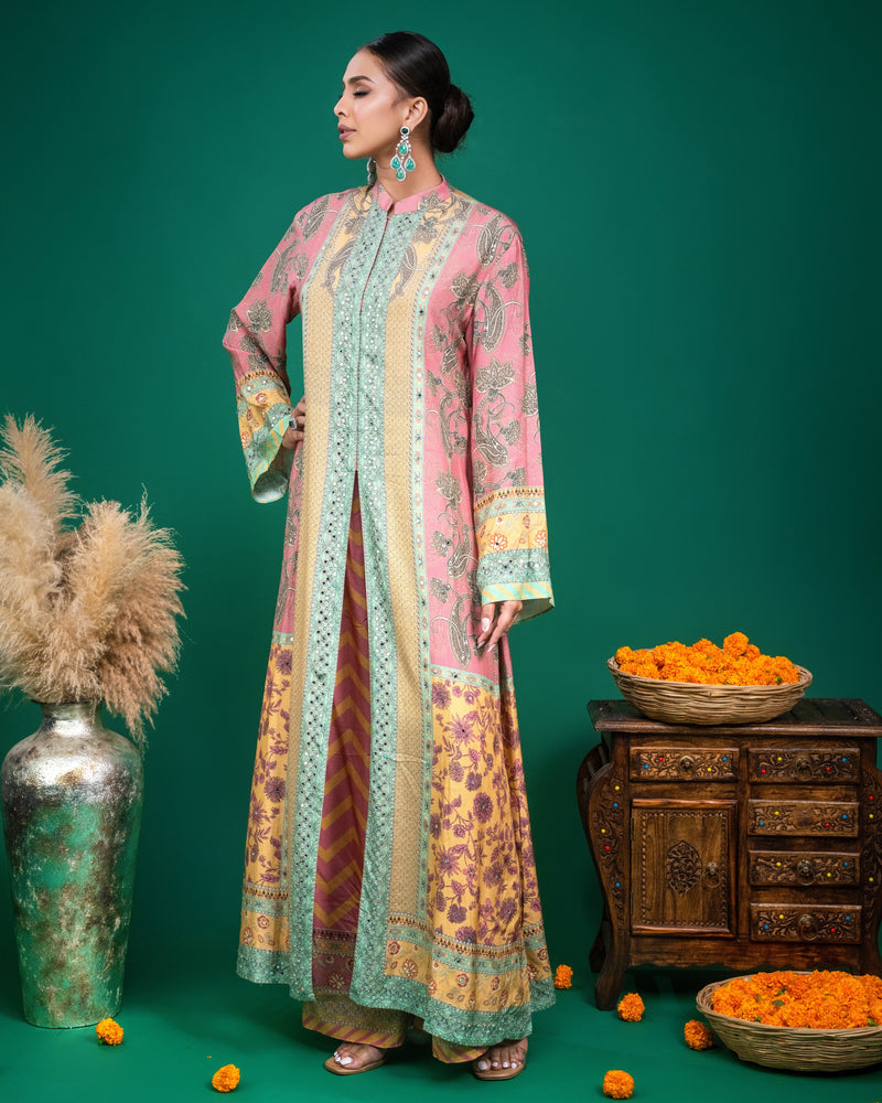Detail of wide bell sleeve cuff with mint green embroidery on printed modal Indo-western dress