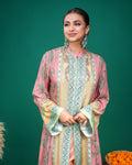 Side angle view of flowing pink and yellow printed modal Indo-western dress with flared sleeves