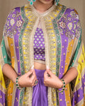 Fabric detail shot highlighting the soft purple modal texture, floral cape print, and mirror work.